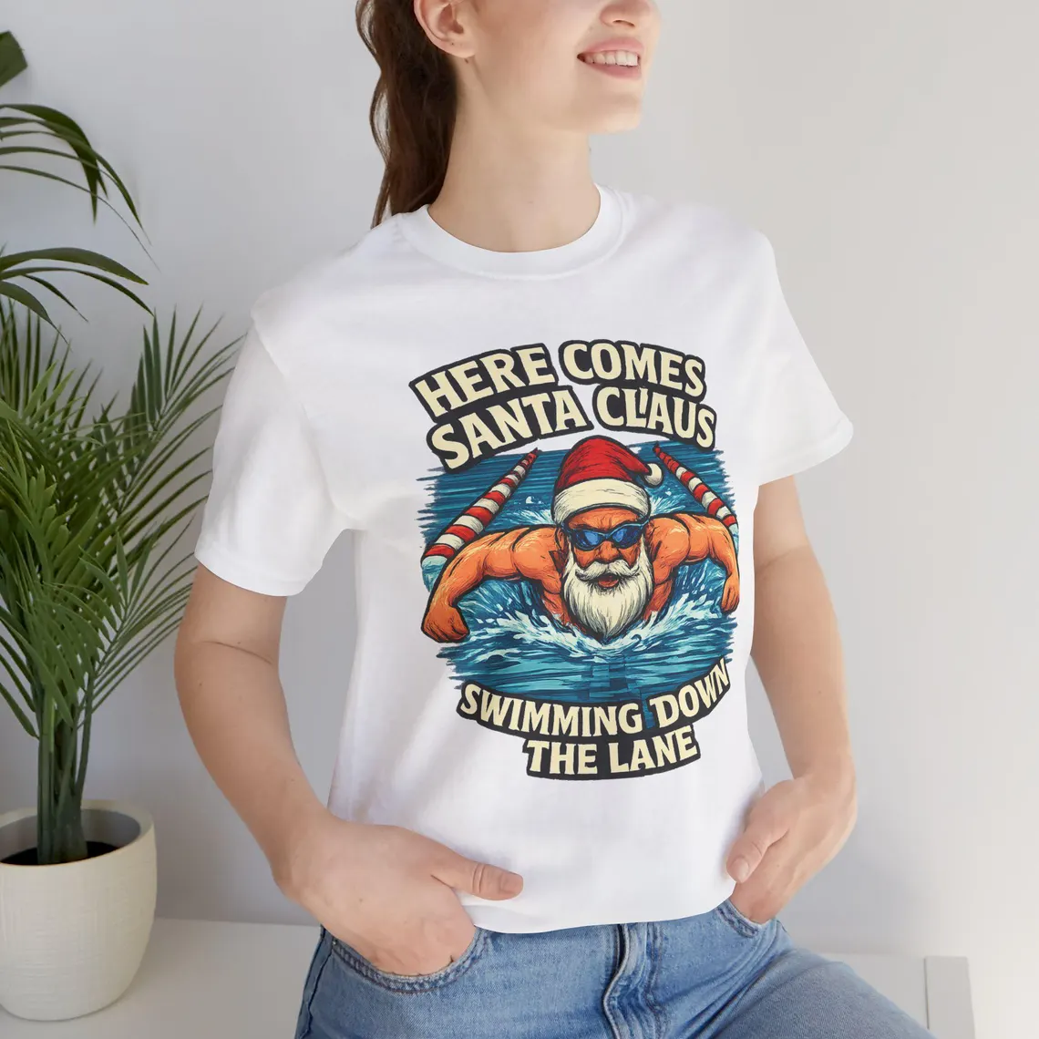 here comes santa claus swimming down the lane white santa– unisex jersey tee here comes santa claus swimming down the lane white santa– unisex jersey tee