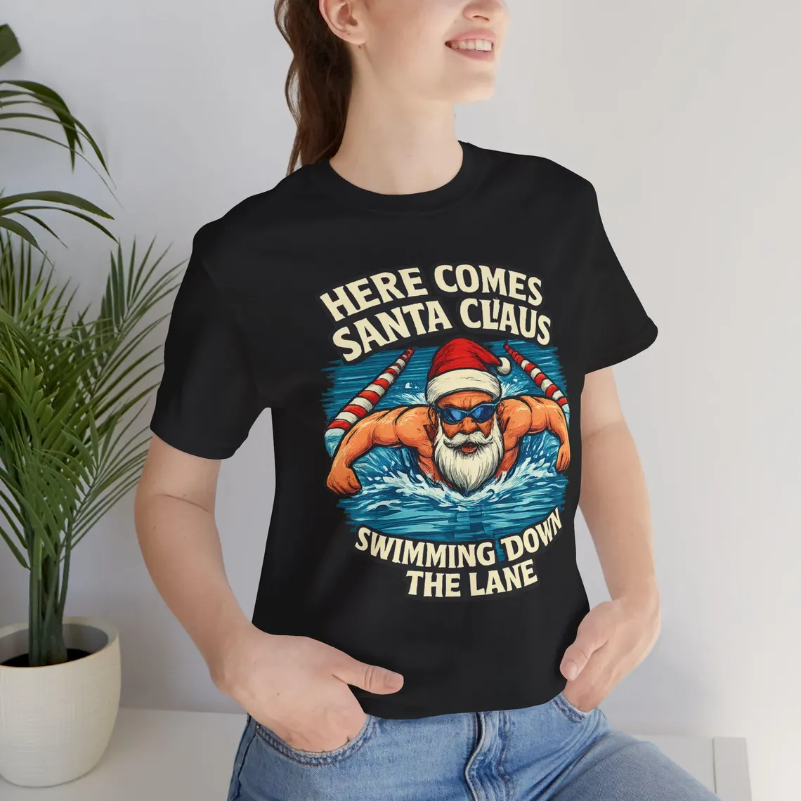 here comes santa claus swimming down the lane white santa– unisex jersey tee here comes santa claus swimming down the lane white santa– unisex jersey tee